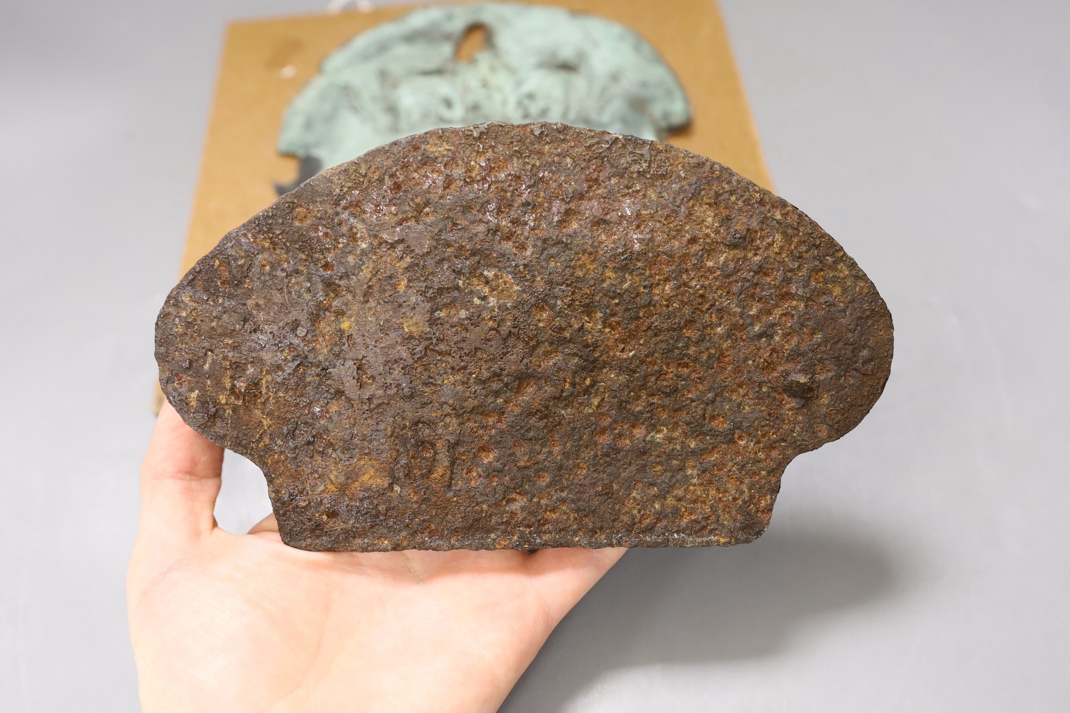 A late 18th century copper Imperial firemark and a cast iron locomotive plaque, Wagon Repairs Ltd, Swansea largest 21cms high